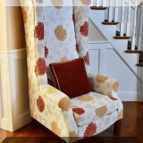 F22. Pair of tall custom upholstered wing chairs. 63”h x 30”w x 33”d 